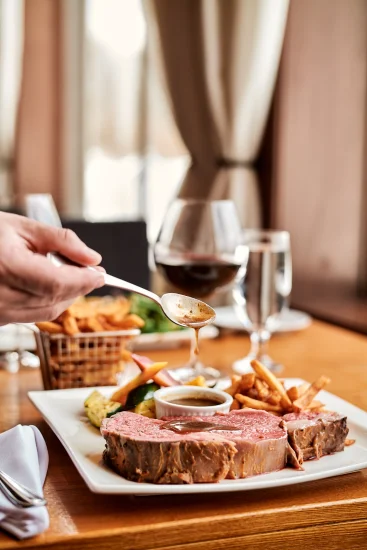 Plat signature du restaurant Tomahawk Grill, préparé par nos chefs talentueux à partir d'ingrédients soigneusement sélectionnés.