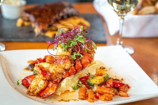 Plat signature du restaurant Tomahawk Grill, préparé par nos chefs talentueux à partir d'ingrédients soigneusement sélectionnés.